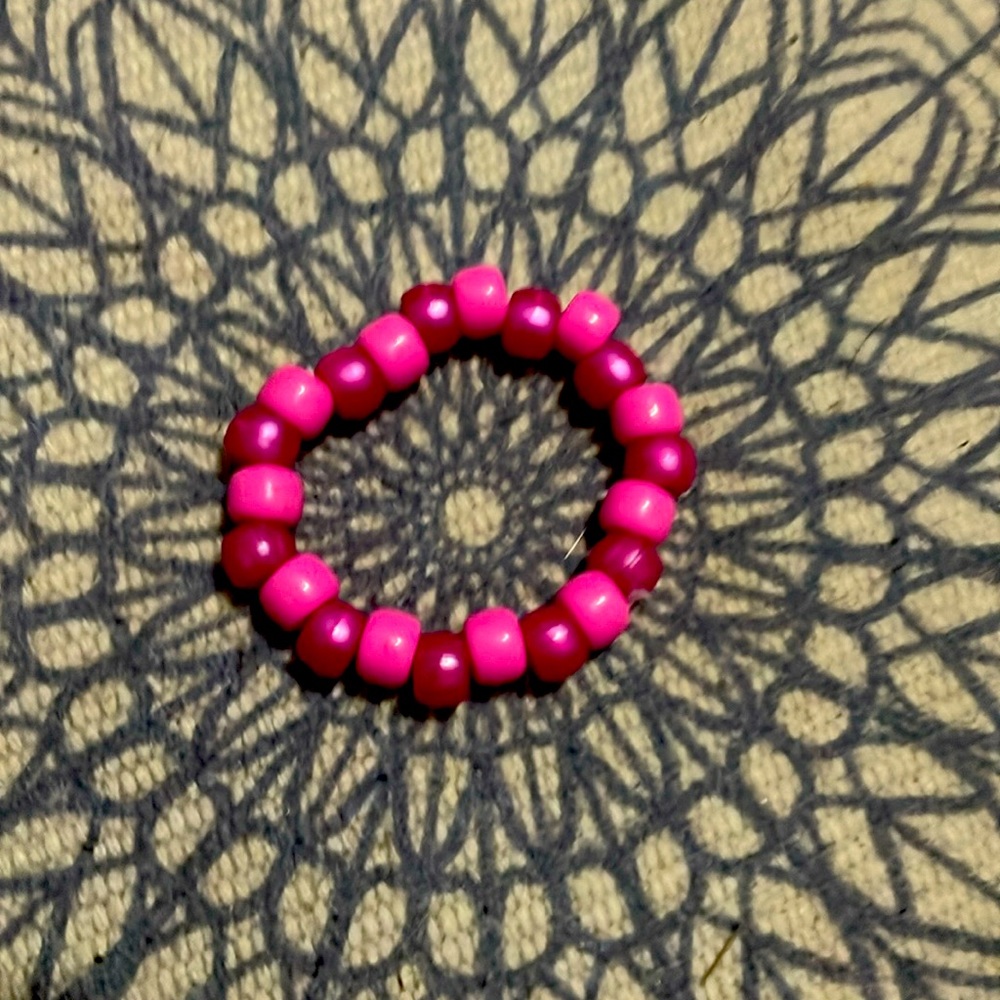 Pink beaded bracelet.